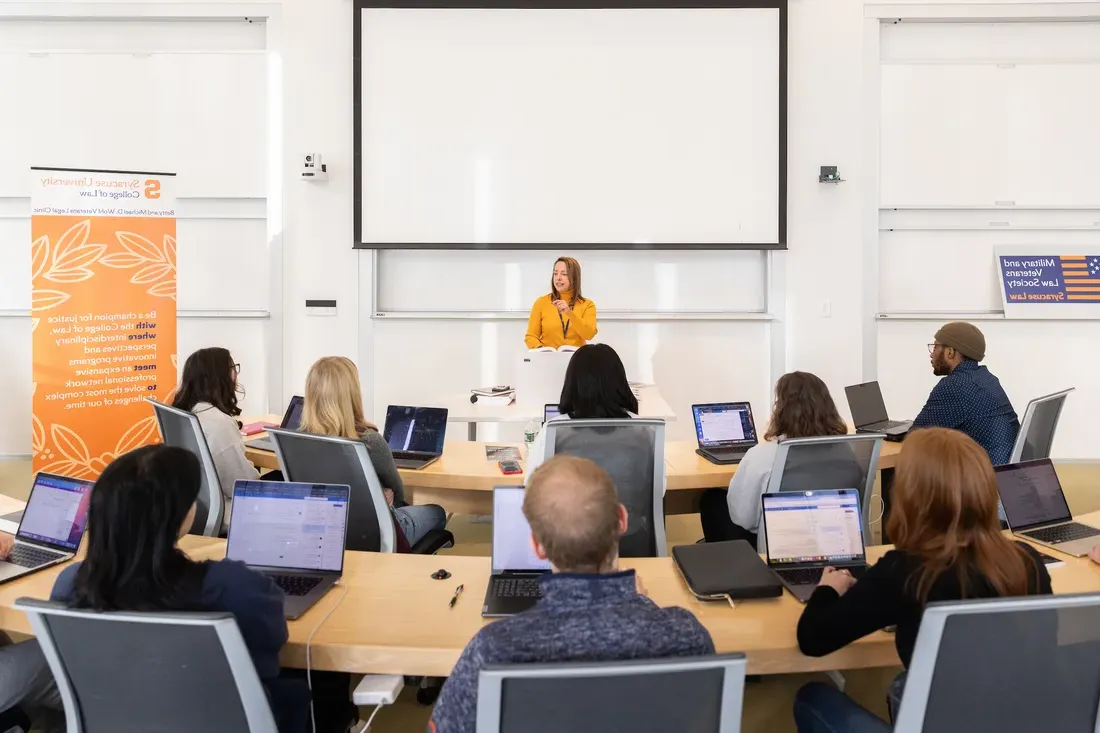 Navy veteran and Syracuse University Law student Laurie Coffey in a classroom.